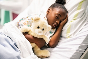 pediatric-sleep-disorders-child-sleeping-with-bear.jpg